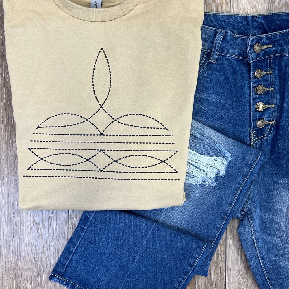 STITCHING in black DTF style unisex tshirt on tan color